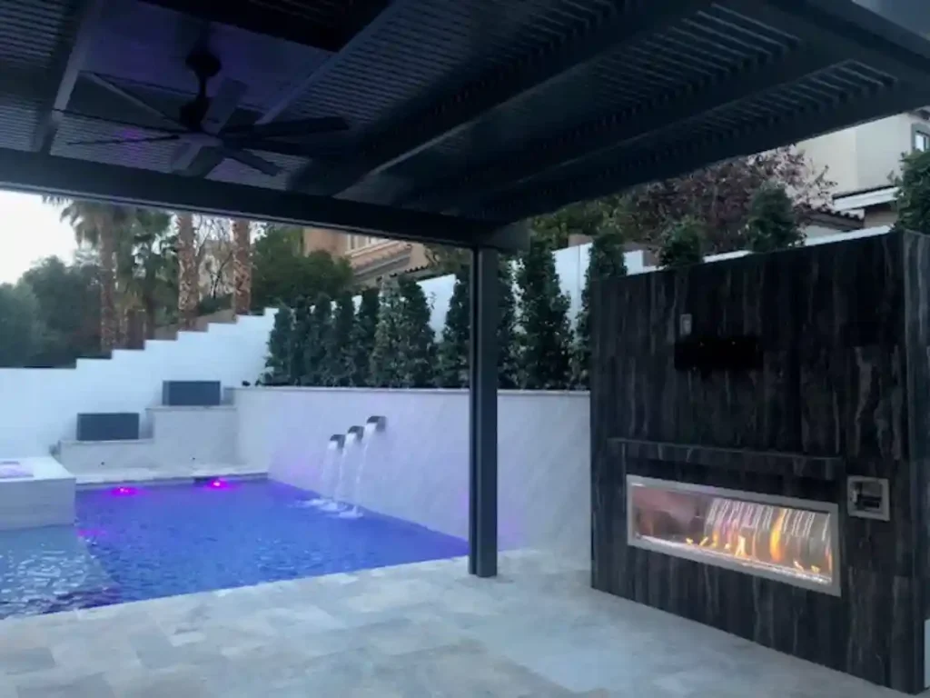 Patio and outdoor living by Edgewater Custom Pools – Penaco Patio Cover Fire Pit Pool