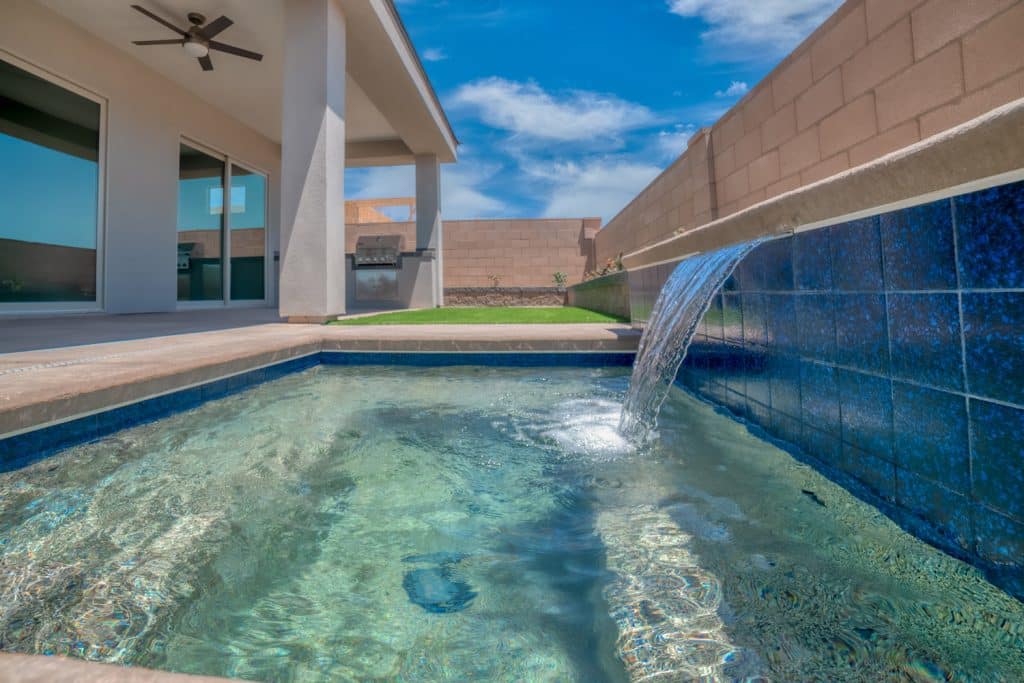 Custom pool by Edgewater Custom Pools – 546 Falcon View Dr