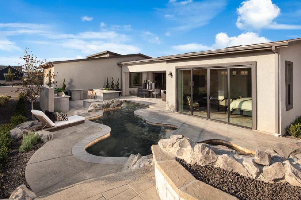Custom pool by Edgewater Custom Pools &ndash; Regency At Caramella Ranch Glenwood Collection Yardley Backyard 2 1800