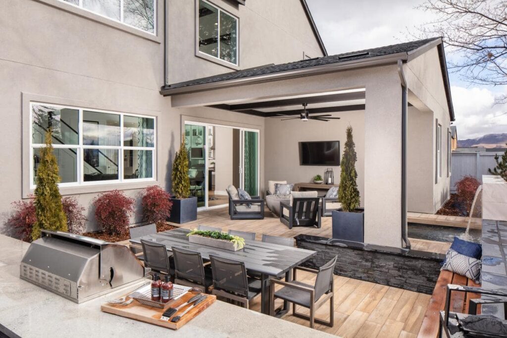 Outdoor living by Edgewater Custom Pools &ndash; Cantaro Essex Elite Back Yard