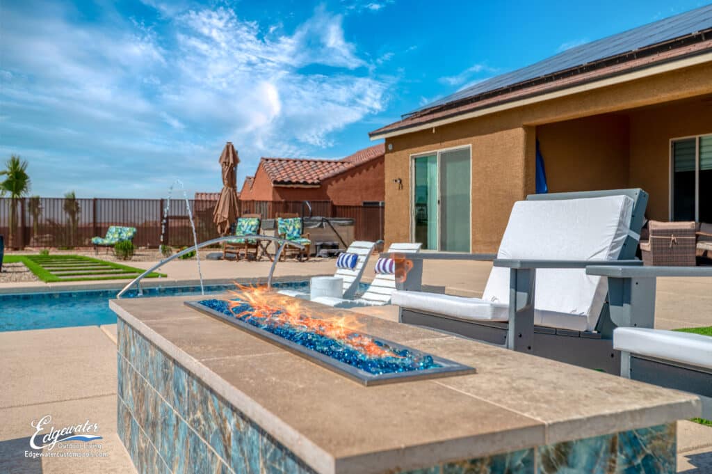 Outdoor living by Edgewater Custom Pools – Cinnamon Fireplace